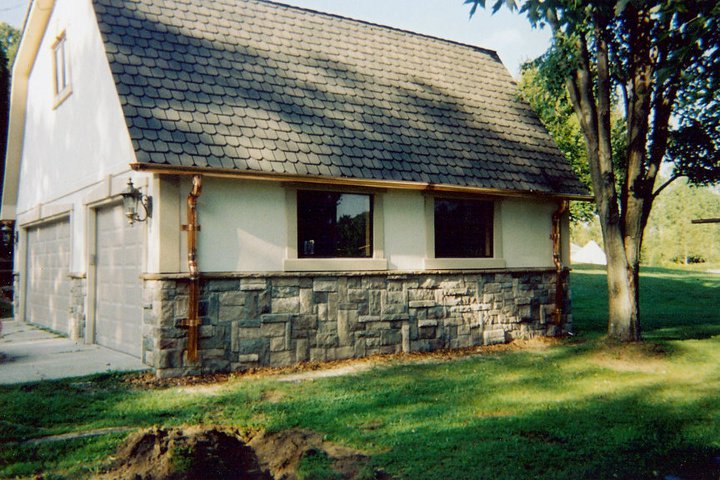 New gutter installation on a barn