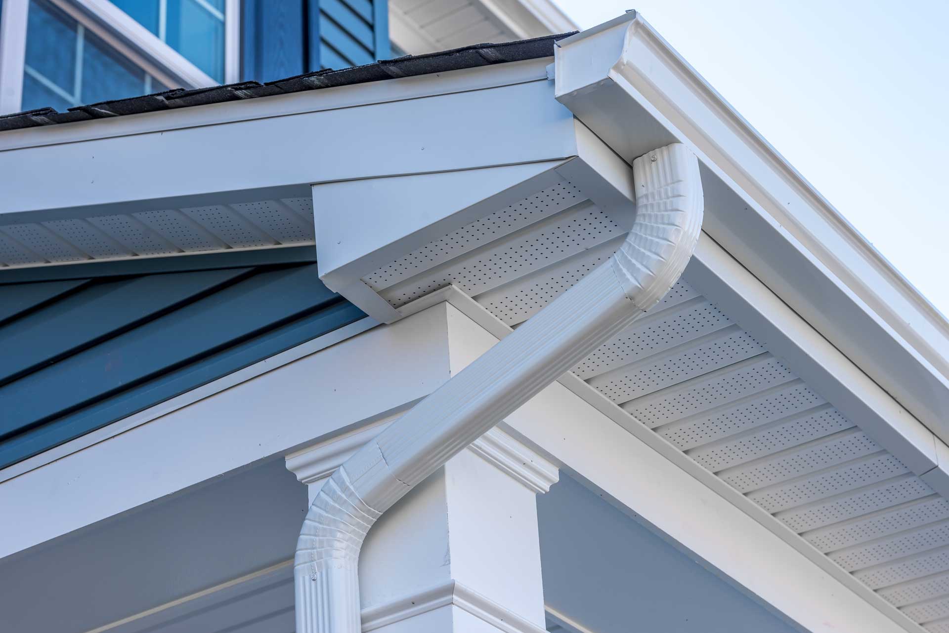 Low-angle shot of newly installed gutters